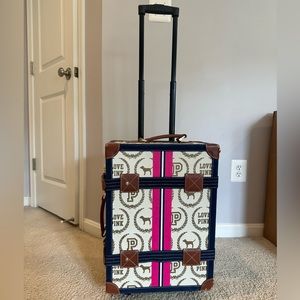 VS pink luggage carry on